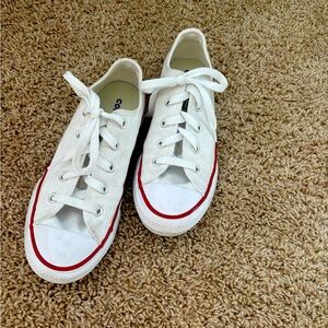 Chuck Taylor’s. Kids size 2. Clean and classic.